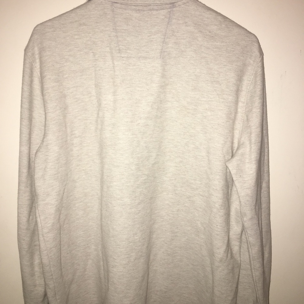 Long sleeve polo.